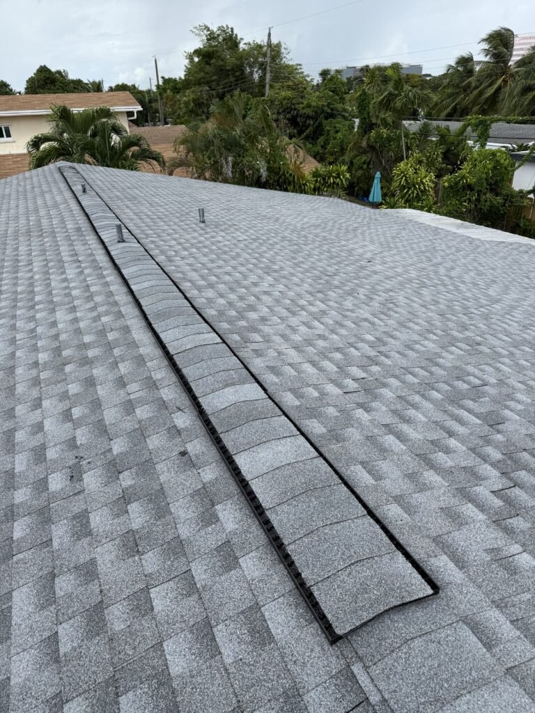 Gray shingle roof project by Glades Roofing & Restoration in Naples, Florida